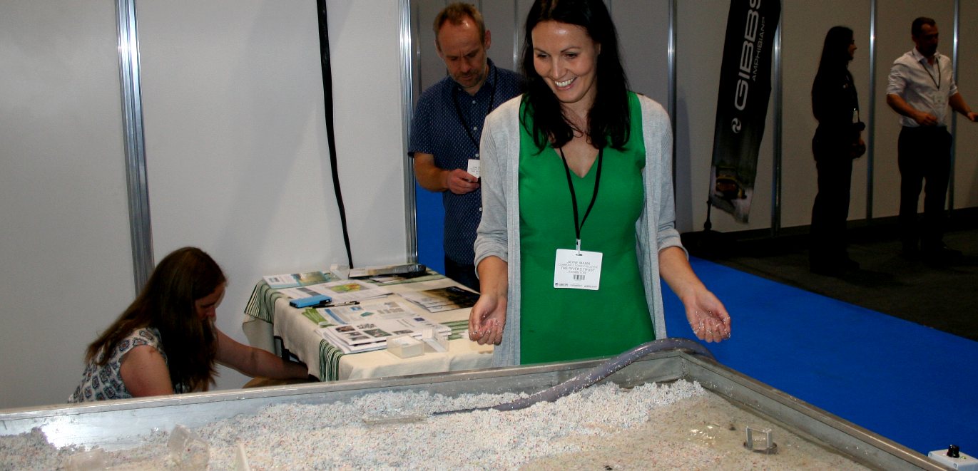 Jayne Mann demonstrating a working river model at the London Expo