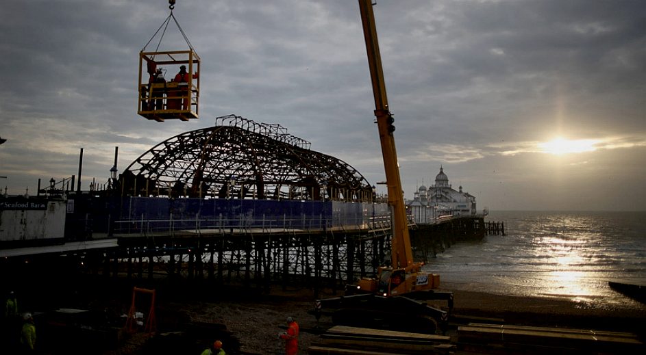 The burnt out shell of the penny arcade on Eastbourne Pier