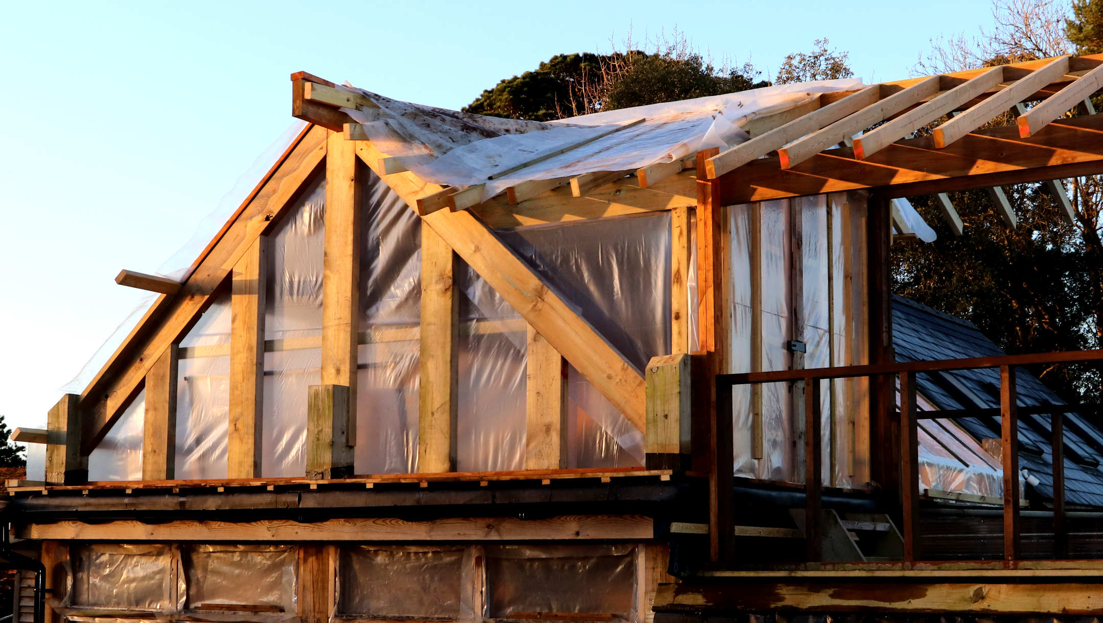 Solar conservatory gable end, polythene weather protection