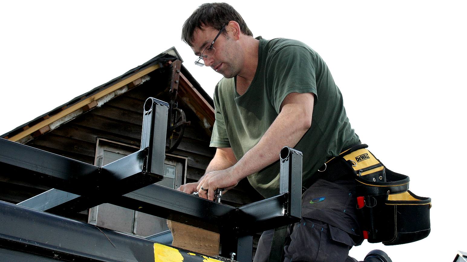 Chris fitting a roof mounted experimental rig to a Ford Transit